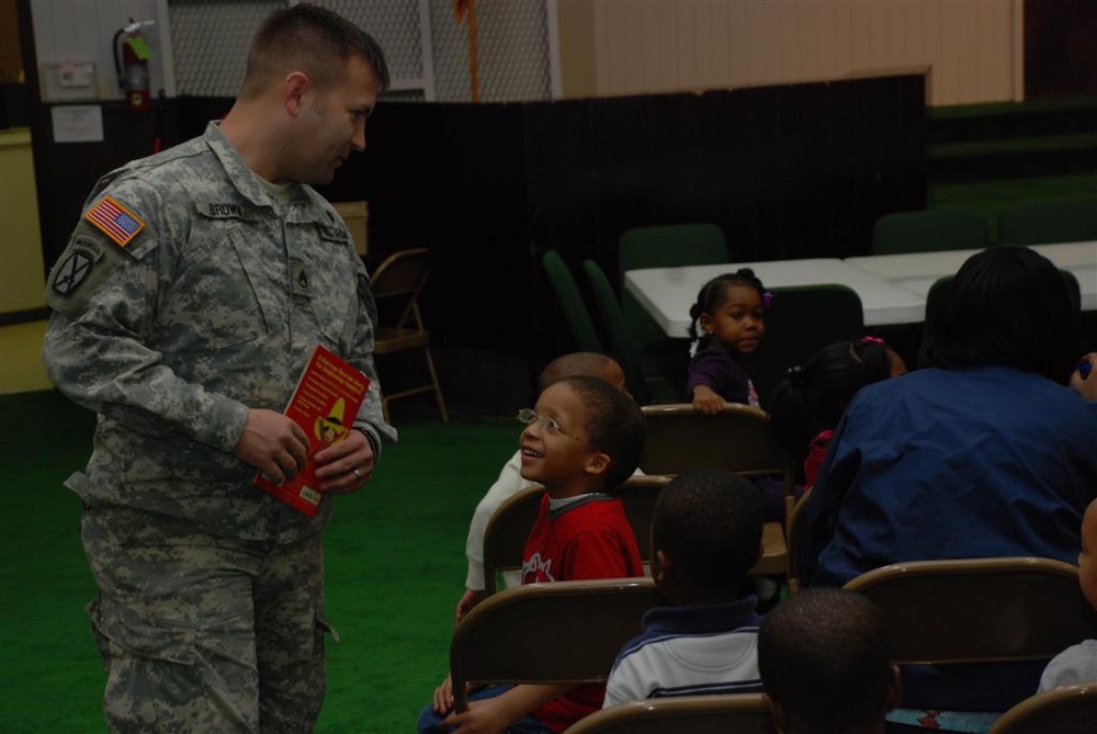 Children Bring Out Kid in Local Soldier