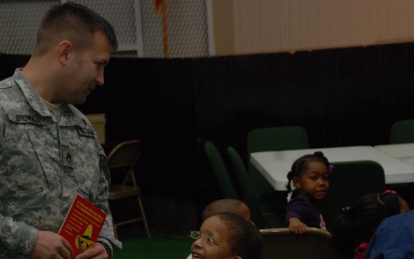 Children Bring Out Kid in Local Soldier