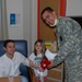 Soldiers bring Christmas spirit to ailing children