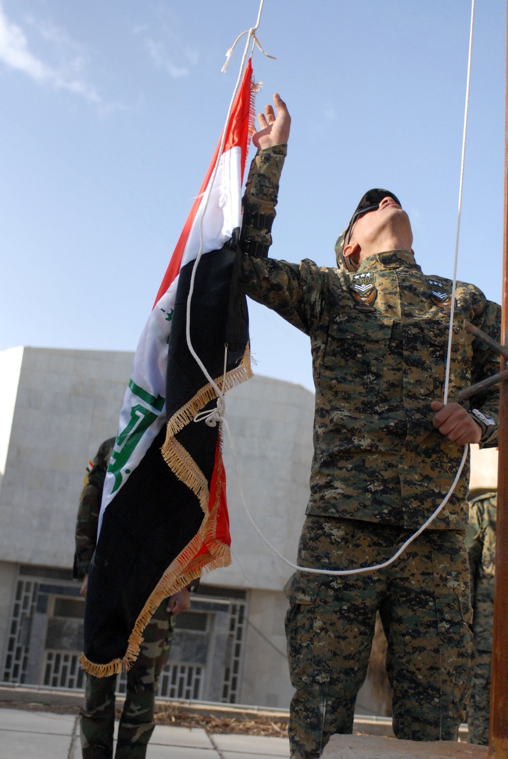 Iraqi Army raises flag on historic day at Forward Operating Base War Eagle