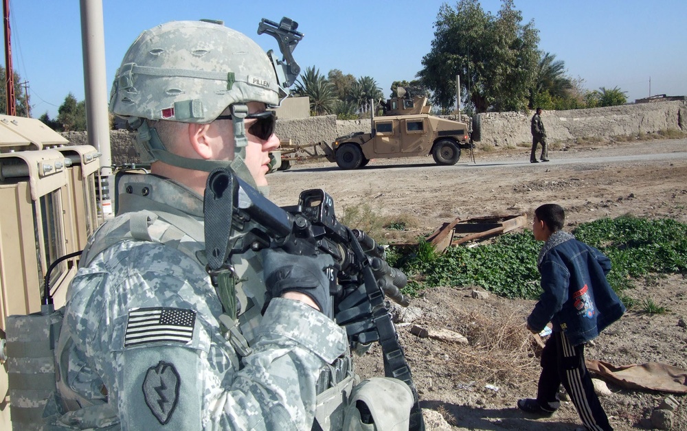 Soldiers help children start New Year off right with new school supplies