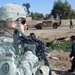 Soldiers help children start New Year off right with new school supplies