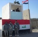 Iraqi National Police fly nation's flag over Joint Security Station Aamel in Baghdad's Rashid