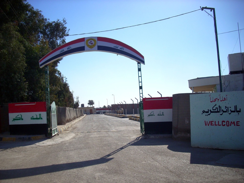 Iraqi National Police fly nation's flag over Joint Security Station Aamel in Baghdad's Rashid