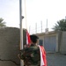 Iraqi national flag flies above Hor al Bash