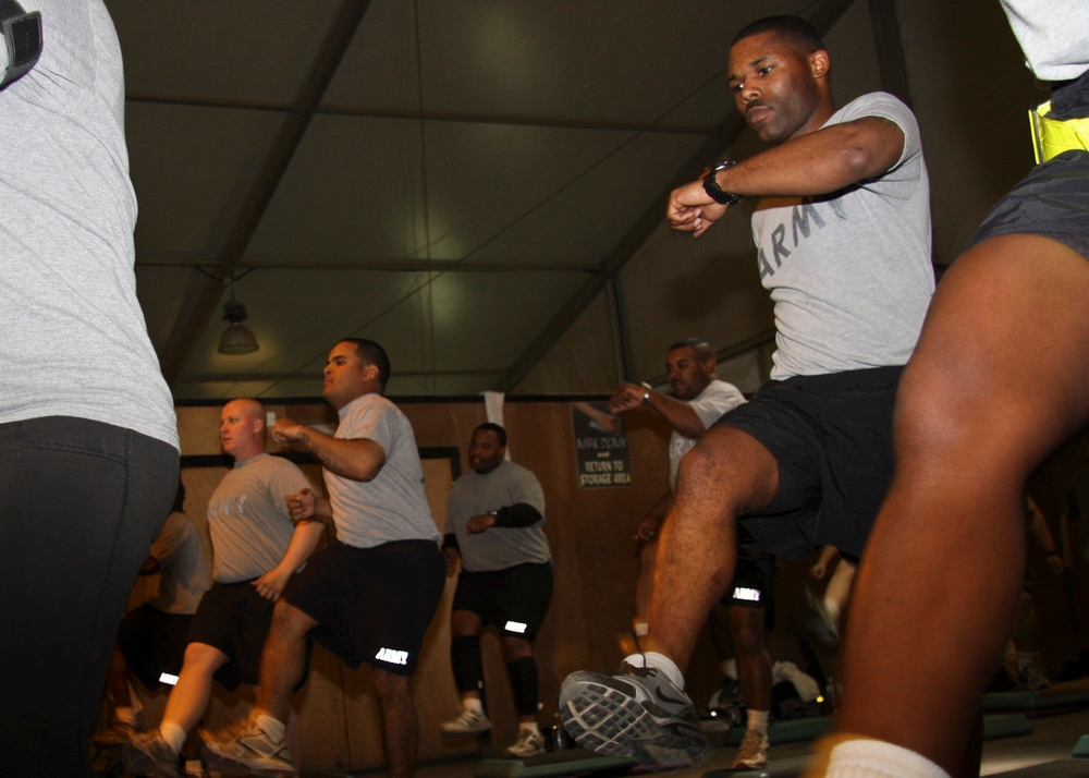 24th Finance Company 1st Sergeant crunches numbers one aerobic step at a time