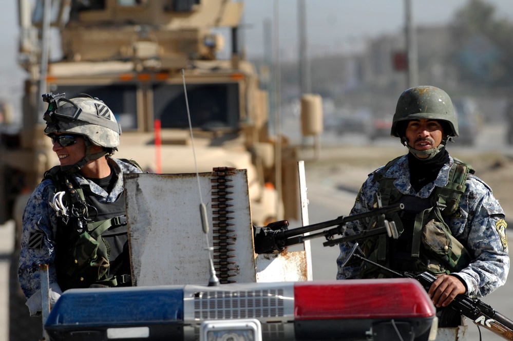 Joint U.S. Army, Iraqi police patrol