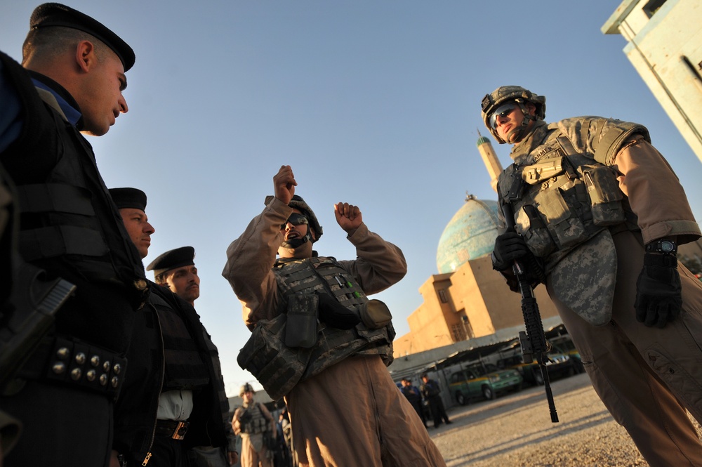 Iraqi police patrol Sadiah