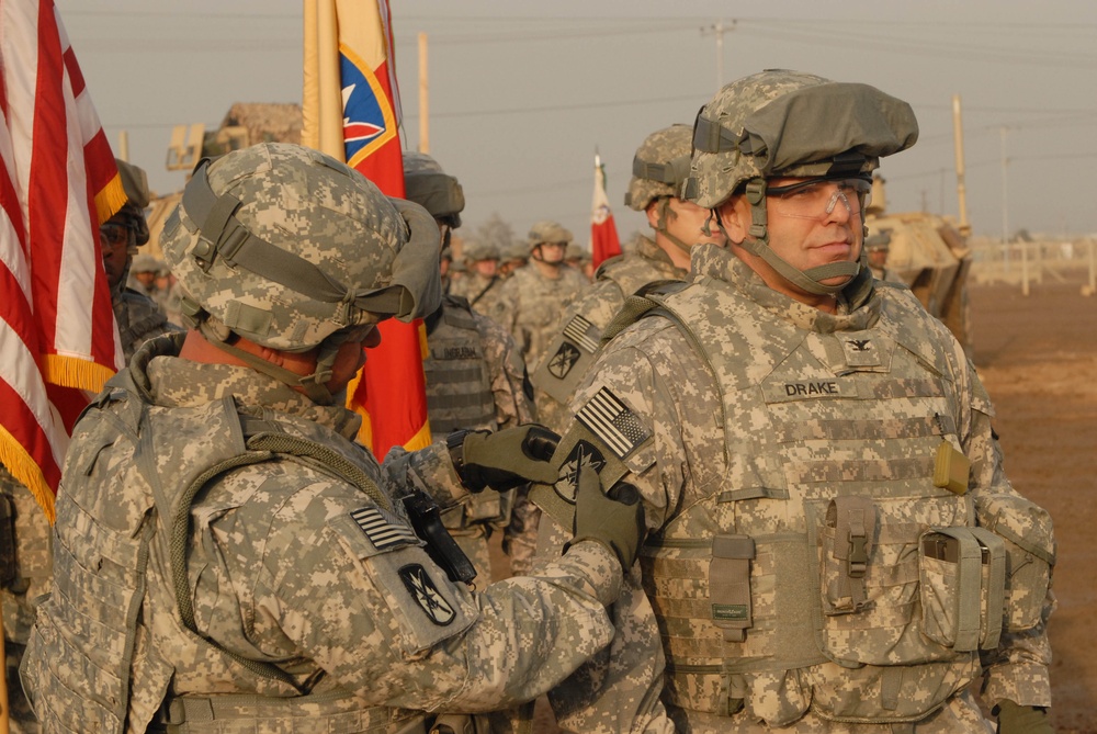 Headquarters, 10th Sustainment Brigade Soldiers earn their shoulder sleeve insignia for wartime service