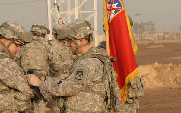 Headquarters, 10th Sustainment Brigade Soldiers earn their shoulder sleeve insignia for wartime service