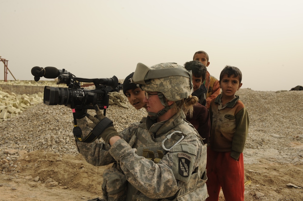 Soldiers tour schools under construction