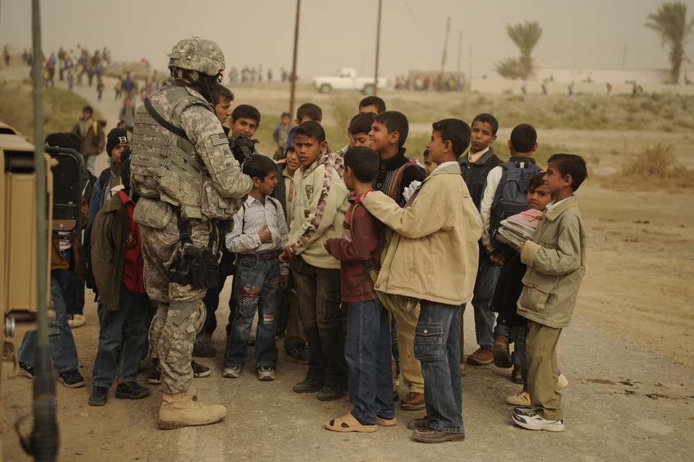 Soldiers tour schools under construction