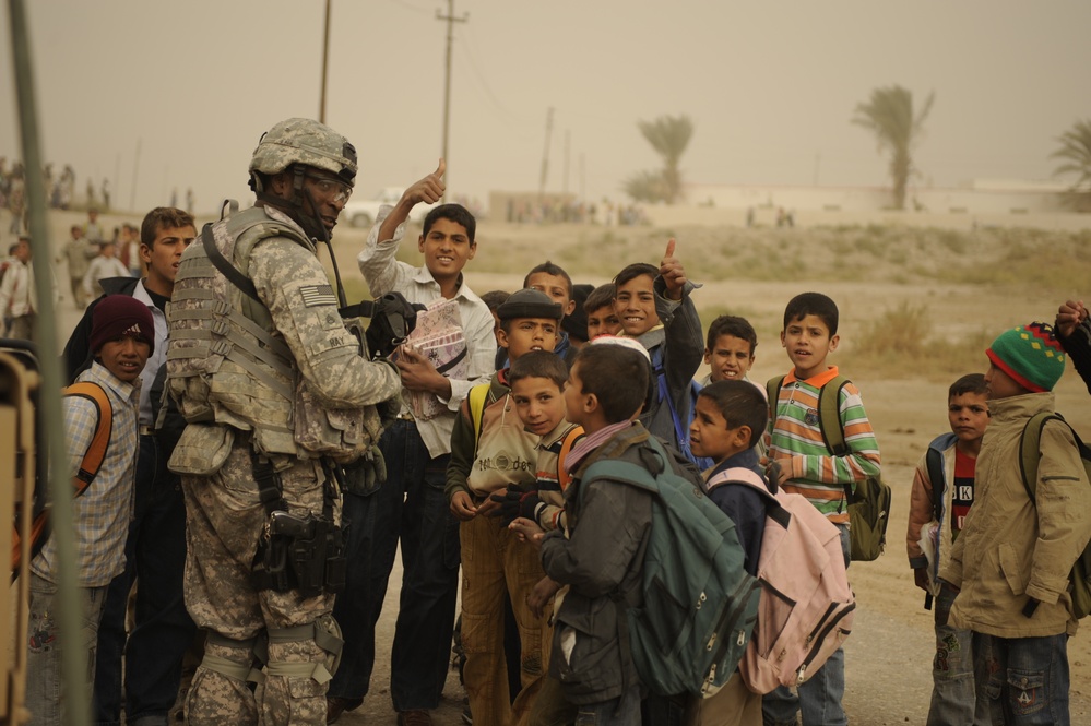 Soldiers tour schools under construction