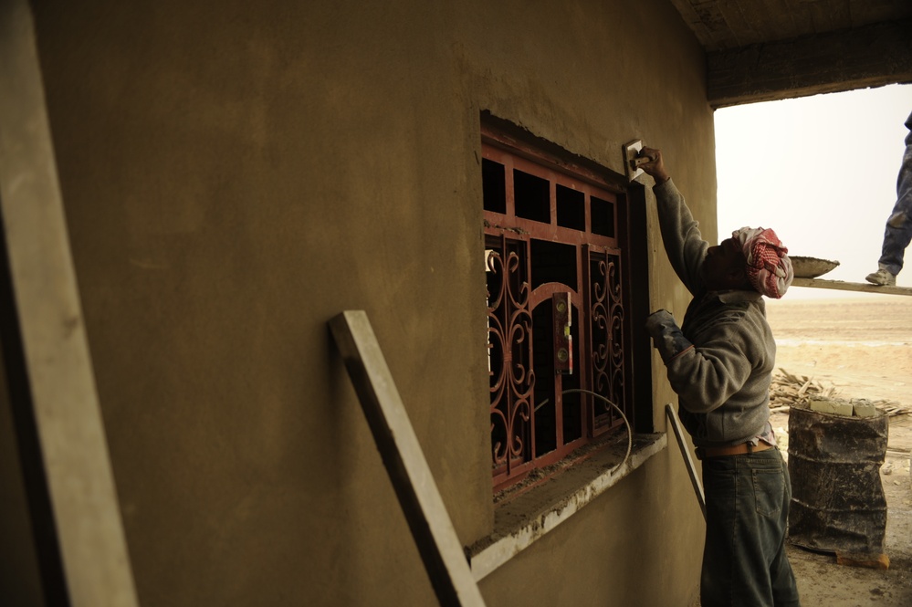 Soldiers tour schools under construction