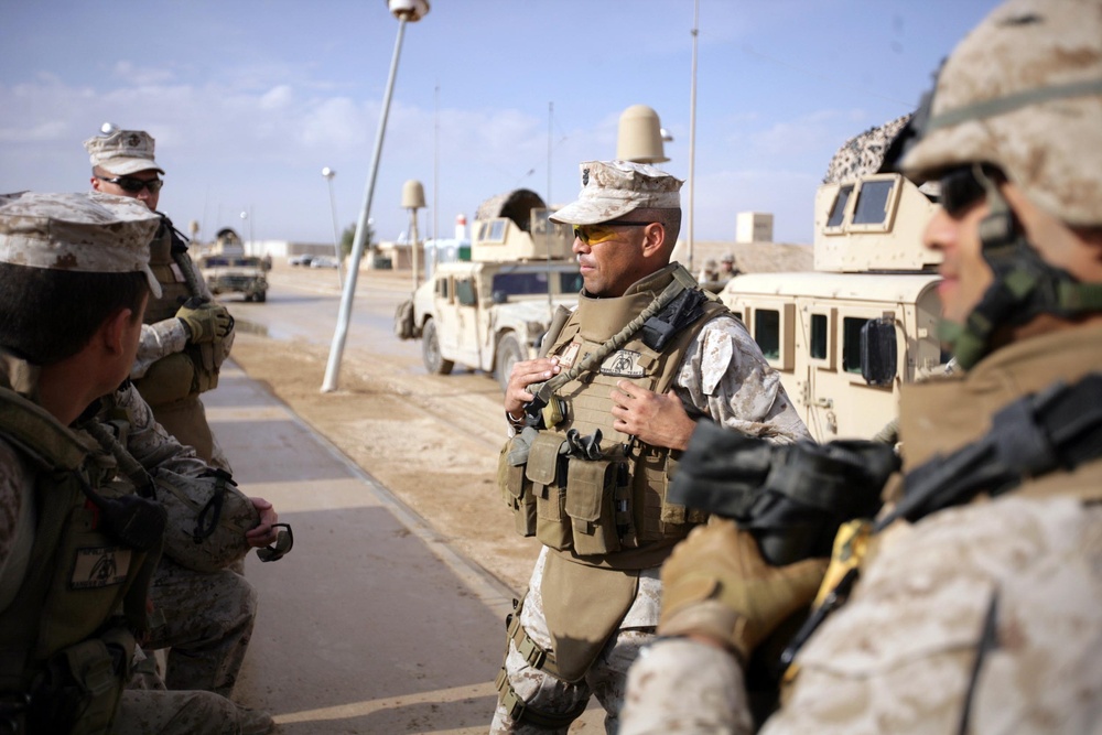 Secretary of the Navy speaks to soldiers at Camp Baharia