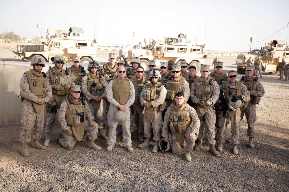 Secretary of the Navy speaks to soldiers at Camp Baharia