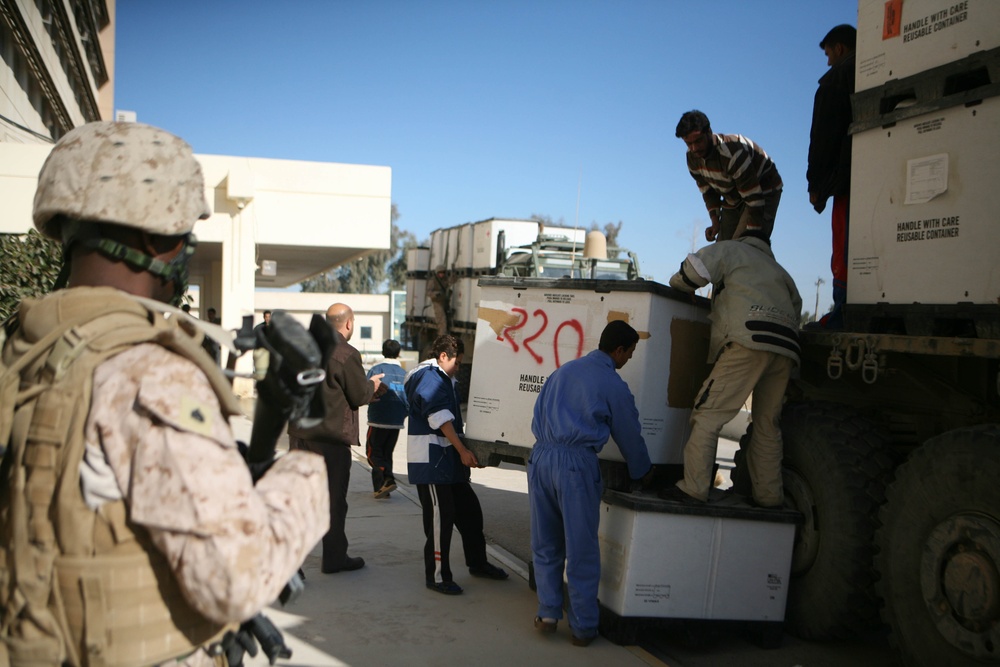Coalition forces pay visit to hospital, donate supplies
