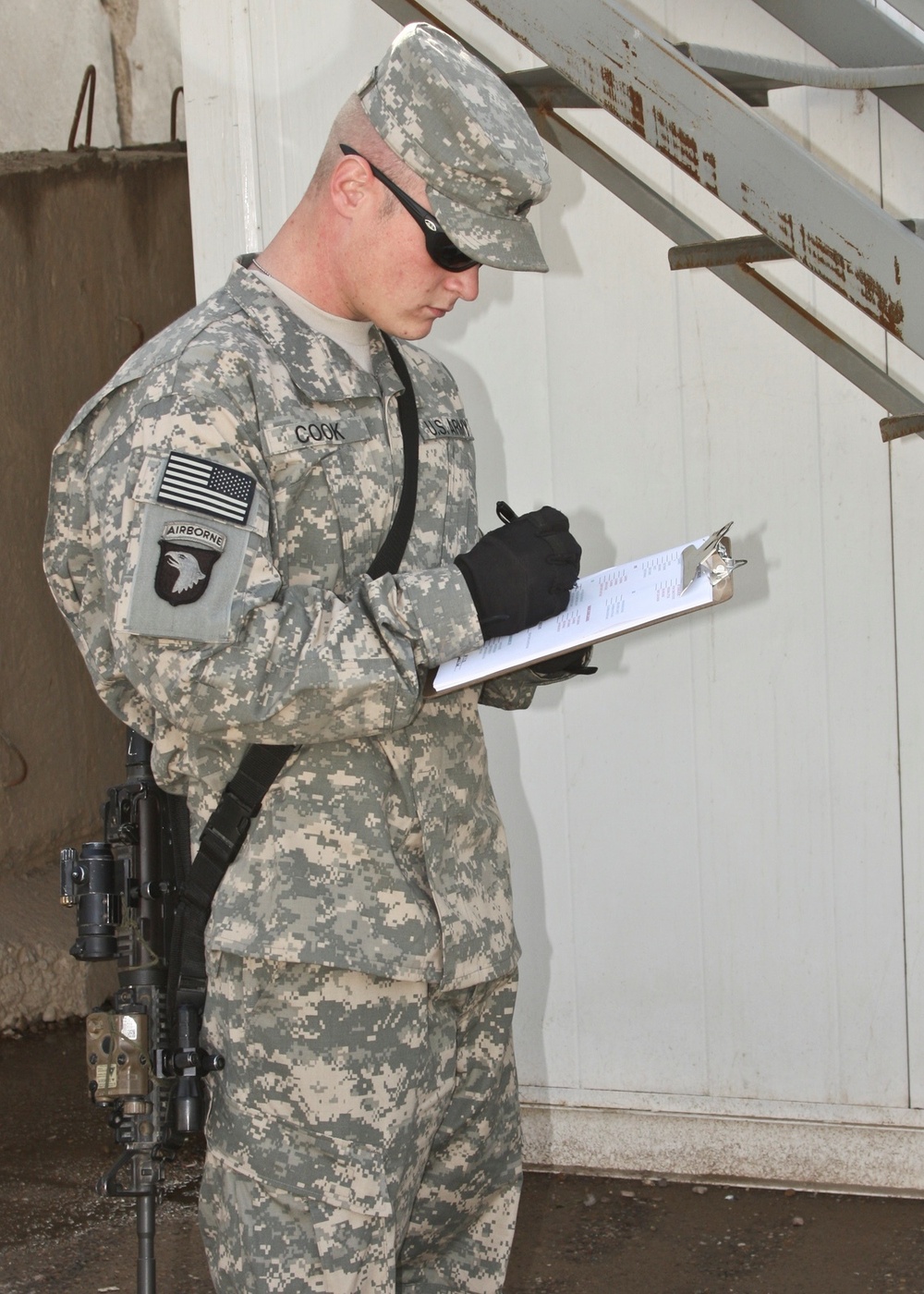 Striker Soldier keeps Forward Operating Base War Eagle clean, functioning