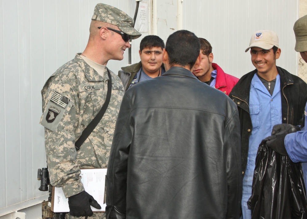 Striker Soldier keeps Forward Operating Base War Eagle clean, functioning