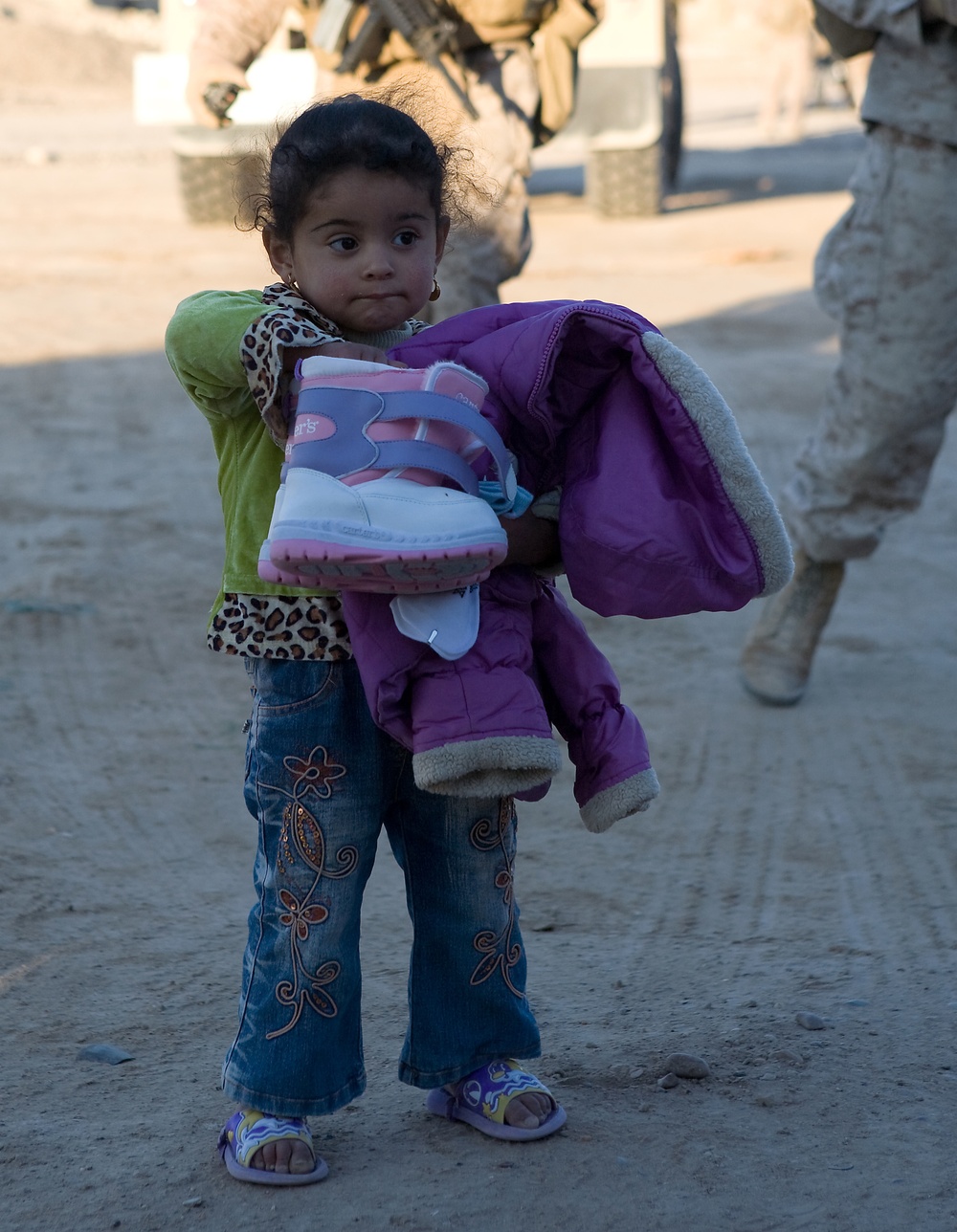 Generous donations help keep Karmah children warm during winter