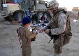 Generous donations help keep Karmah children warm during winter