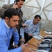 Iraqi police dispatch calls at Provincial Joint Coordination Center