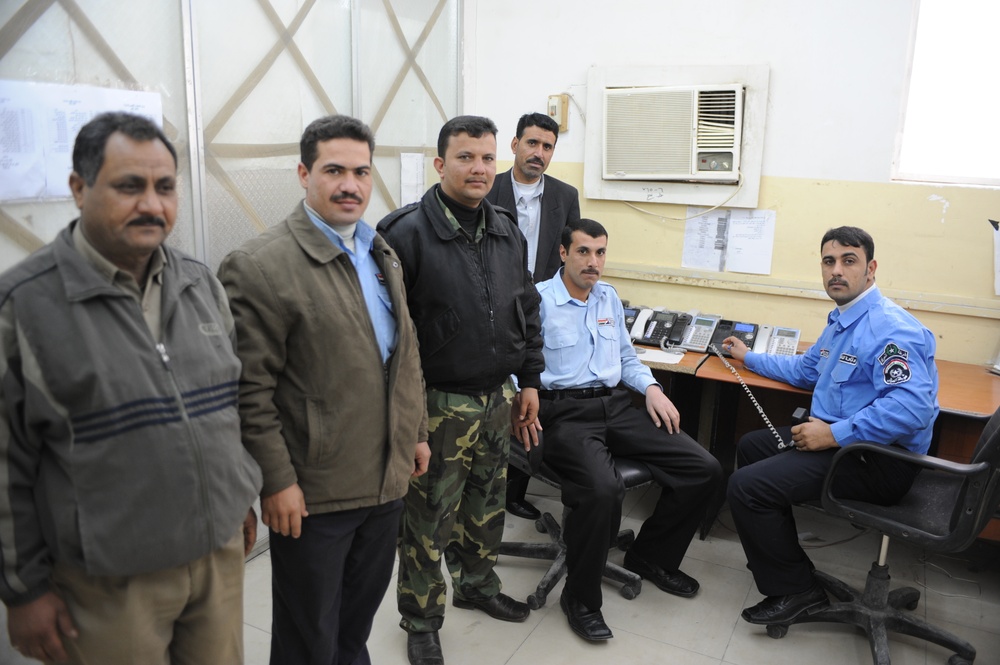 Iraqi police dispatch calls at Provincial Joint Coordination Center