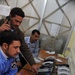 Iraqi police dispatch calls at Provincial Joint Coordination Center