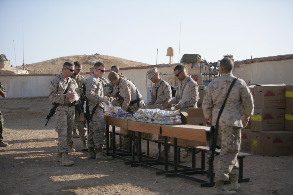 Coalition forces provide medical care in Harwan