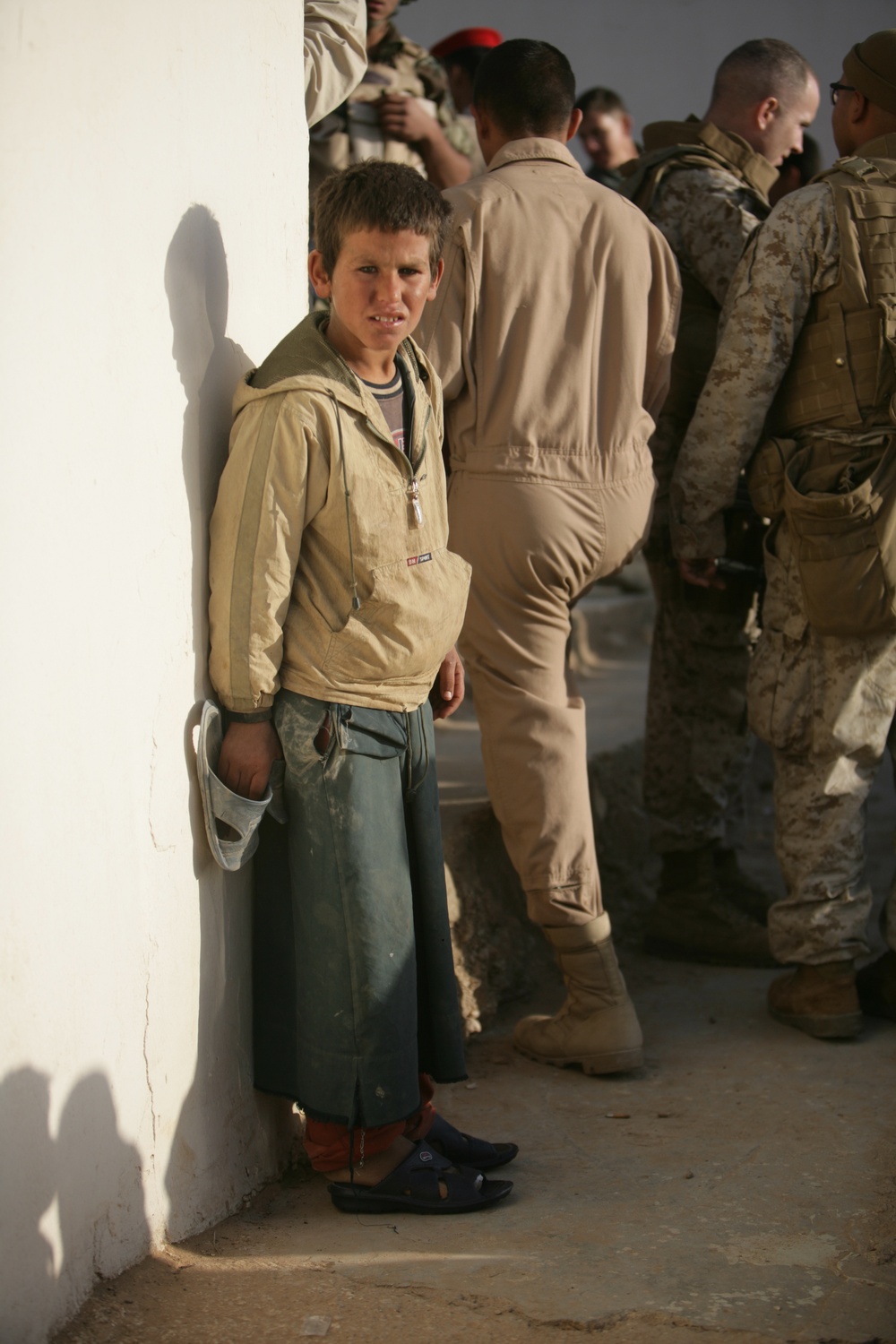 Coalition forces provide medical care in Harwan