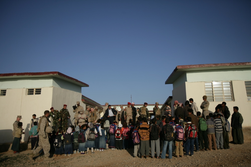 Coalition forces provide medical care in Harwan