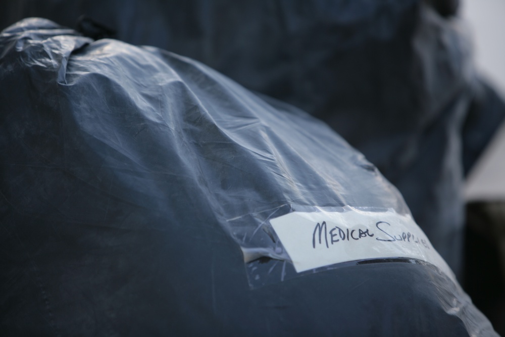 Coalition forces provide medical care in Harwan