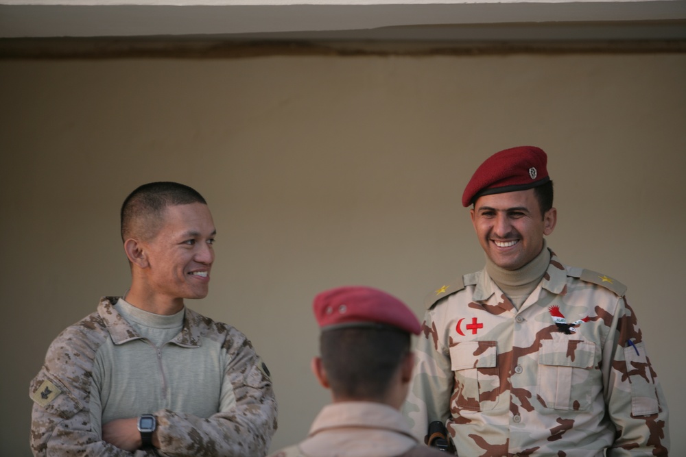 Coalition forces provide medical care in Harwan