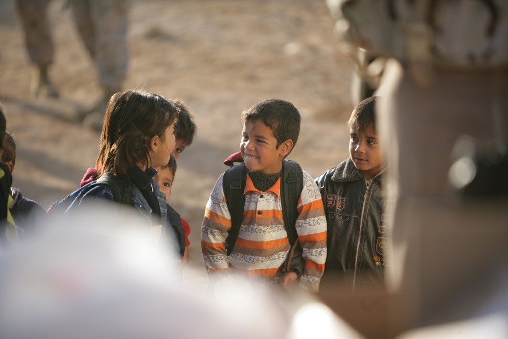 Coalition forces provide medical care in Harwan