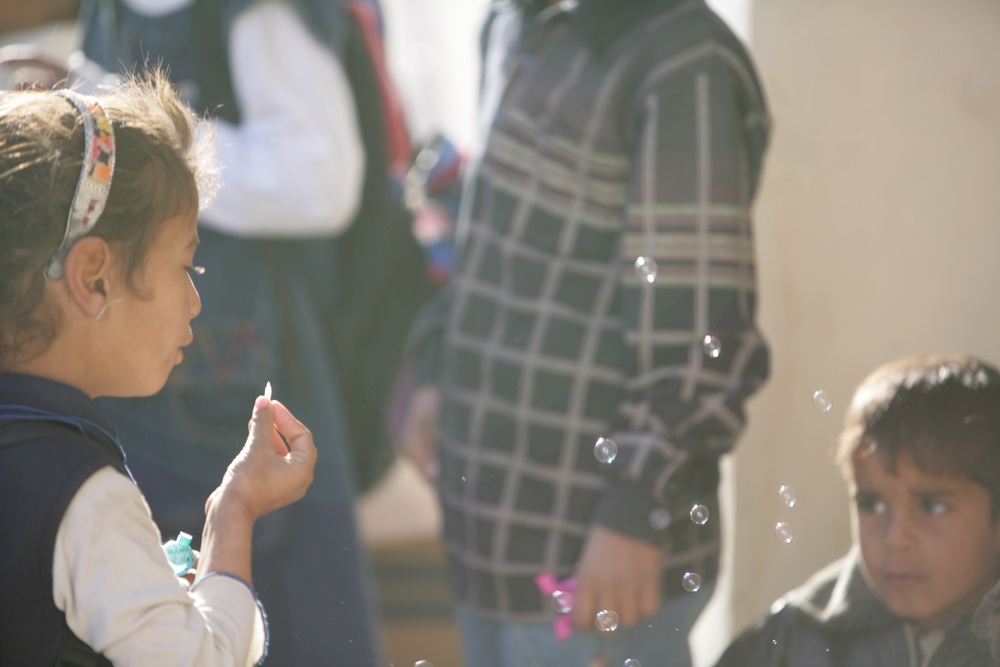 Coalition forces provide medical care in Harwan