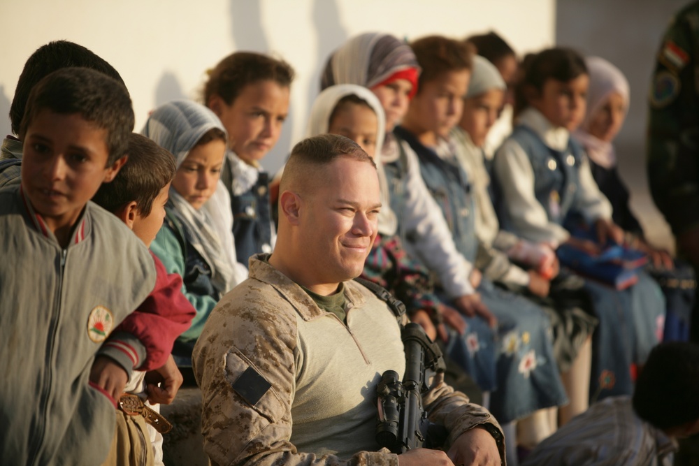 Coalition forces provide medical care in Harwan