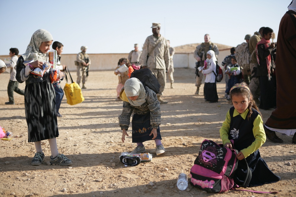 Coalition forces provide medical care in Harwan