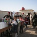 Coalition forces provide medical care in Harwan