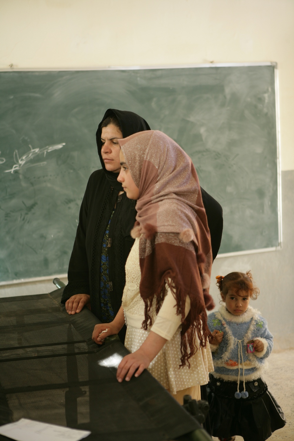 Coalition forces provide medical care in Harwan