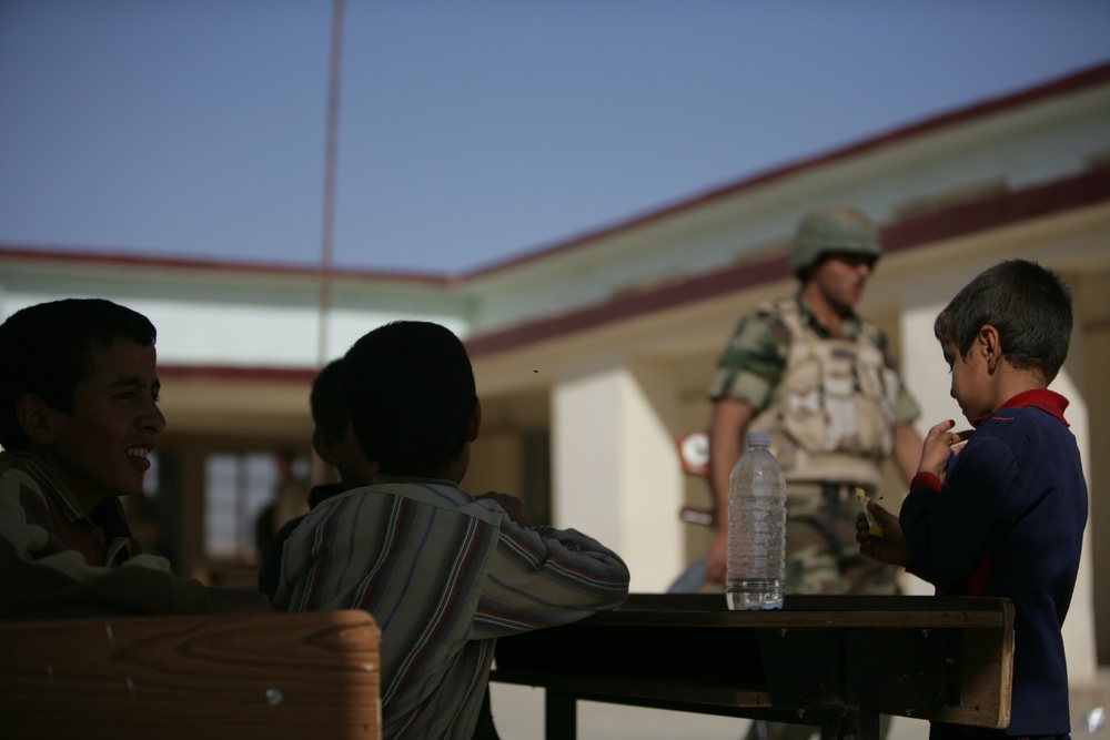 Coalition forces provide medical care in Harwan