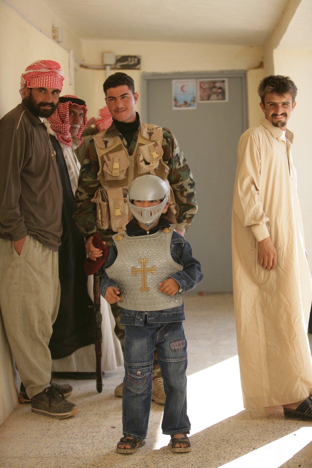 Coalition forces provide medical care in Harwan