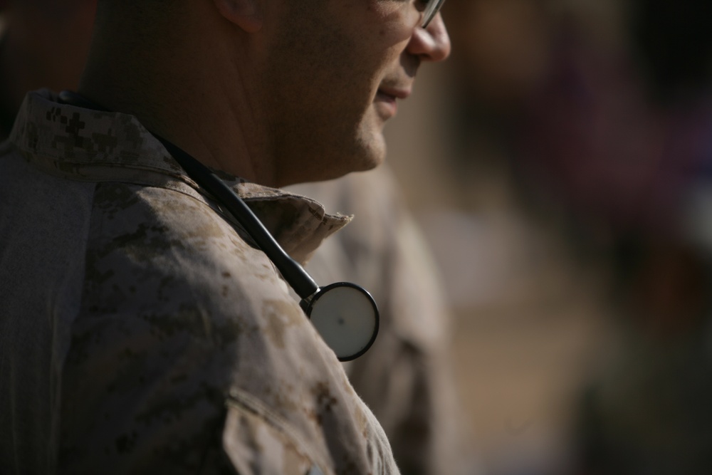 Coalition forces provide medical care in Harwan