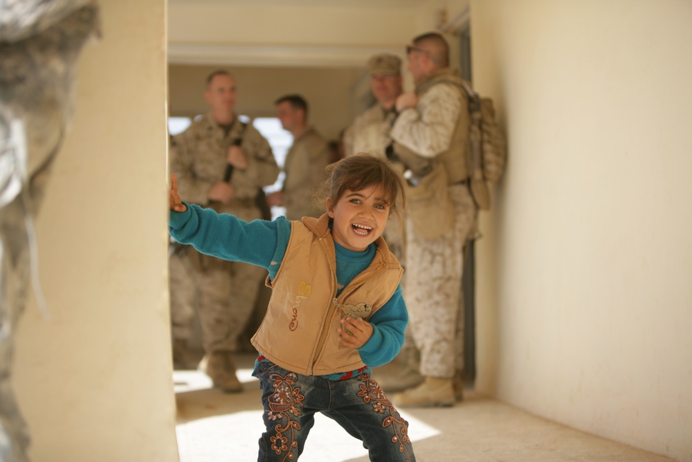 Coalition forces provide medical care in Harwan