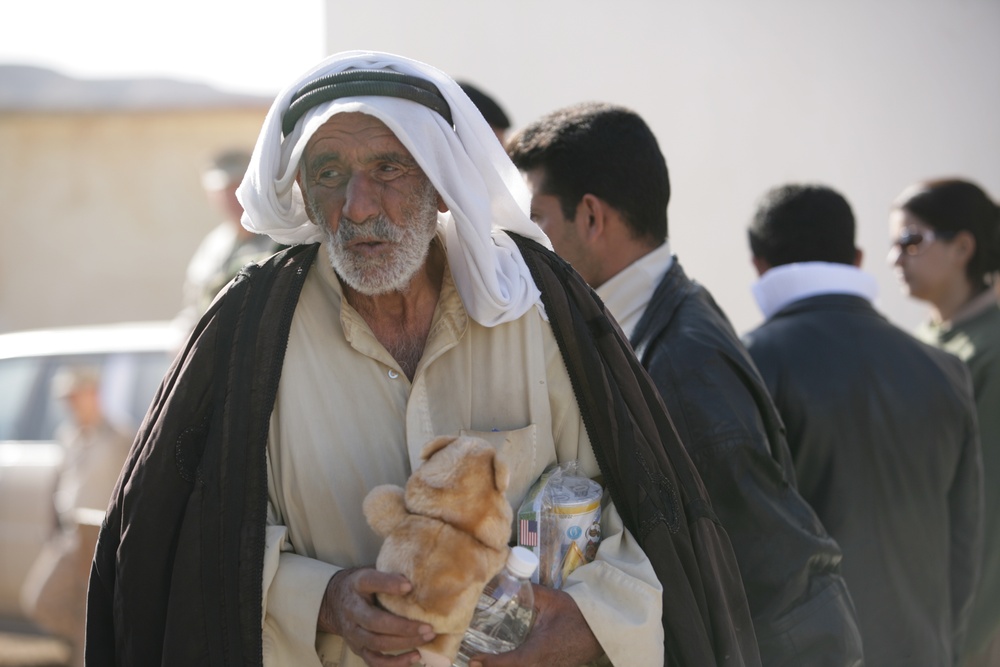 Coalition forces provide medical care in Harwan