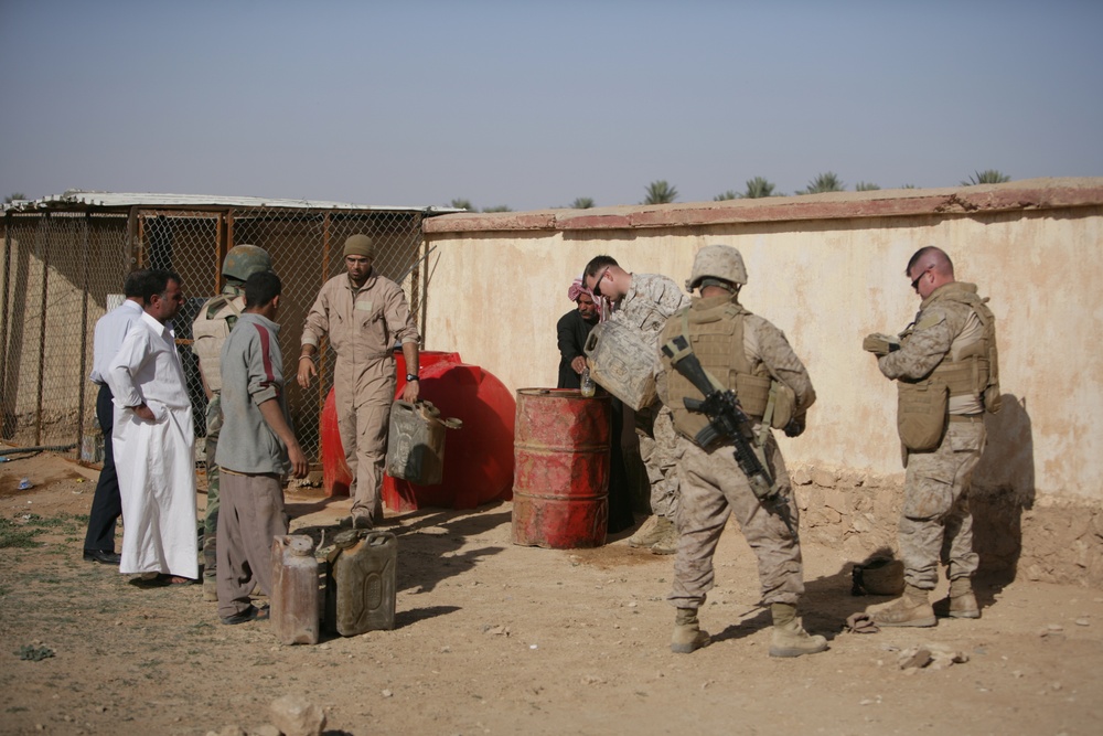 Coalition forces provide medical care in Harwan