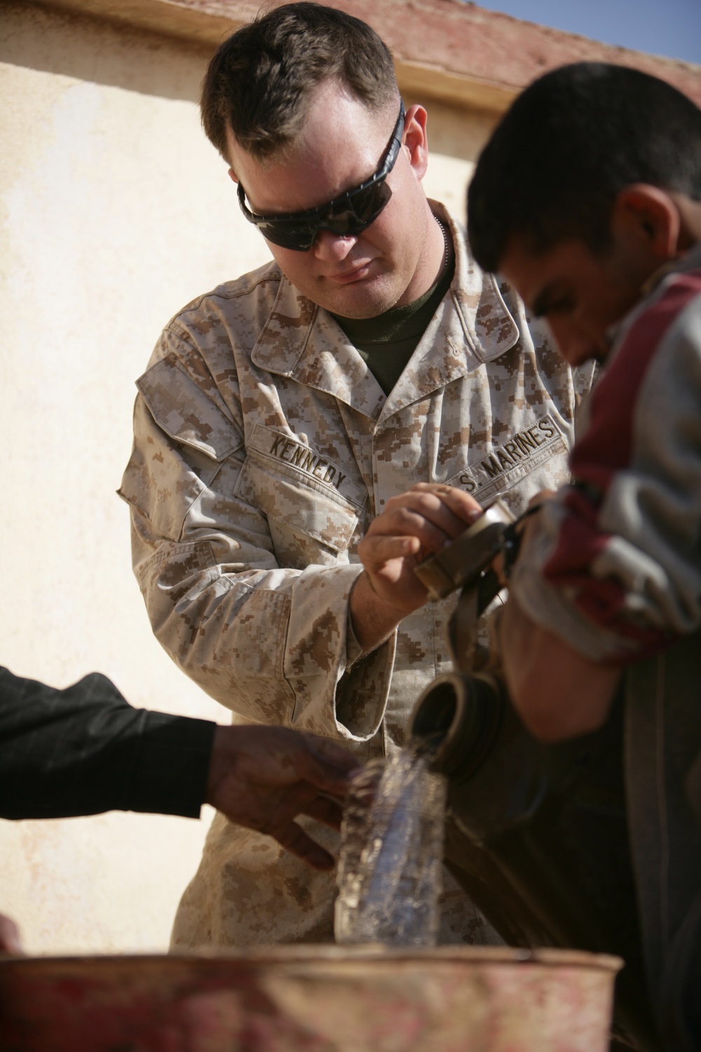 Coalition forces provide medical care in Harwan