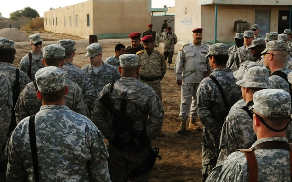 Troop C, 1st Squadron, 10th Cavalry Regiment Soldiers hold combat patch