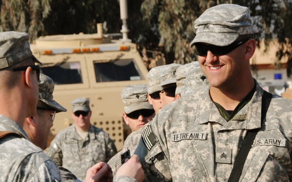 Troop C, 1st Squadron, 10th Cavalry Regiment Soldiers hold combat patch