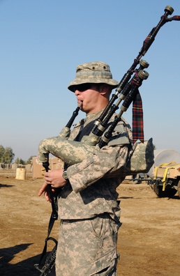 Troop C, 1st Squadron, 10th Cavalry Regiment Soldiers hold combat patch