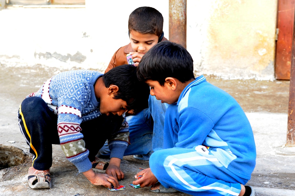 Iraqi children play in the streets of Basra